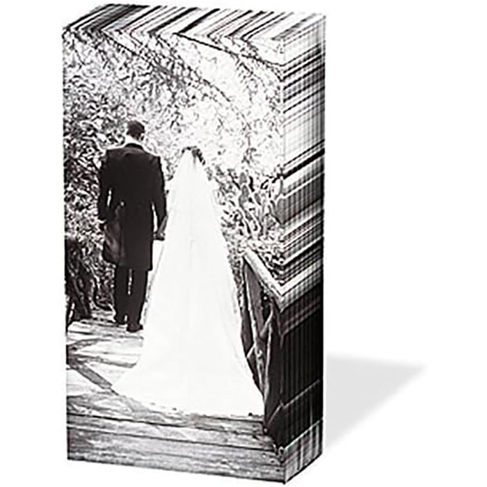 Tissue print with a black and white photo of a bride and groom walking together.