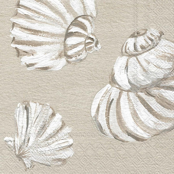 White shells cocktail napkins on a beige background