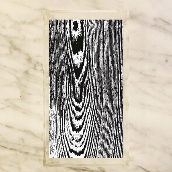 woodgrain guest paper towels with natural variegated wood pattern displayed in a clear holder, neutral napkins for entertaining