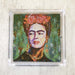 Frida lunch paper napkins featuring Frida Kahlo with a vibrant floral headpiece in a green background