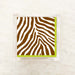 Paper napkin featuring a bold cocoa brown and white zebra stripe pattern with a green border
