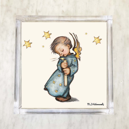 Vintage-style paper napkin featuring a Hummel-inspired illustration of an angelic child holding a candle, surrounded by golden stars, with soft pastel colors and delicate detailing