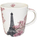 April in Paris Ceramic Mug — white ceramic mug with Eiffel Tower and pink cherry blossom print, front view