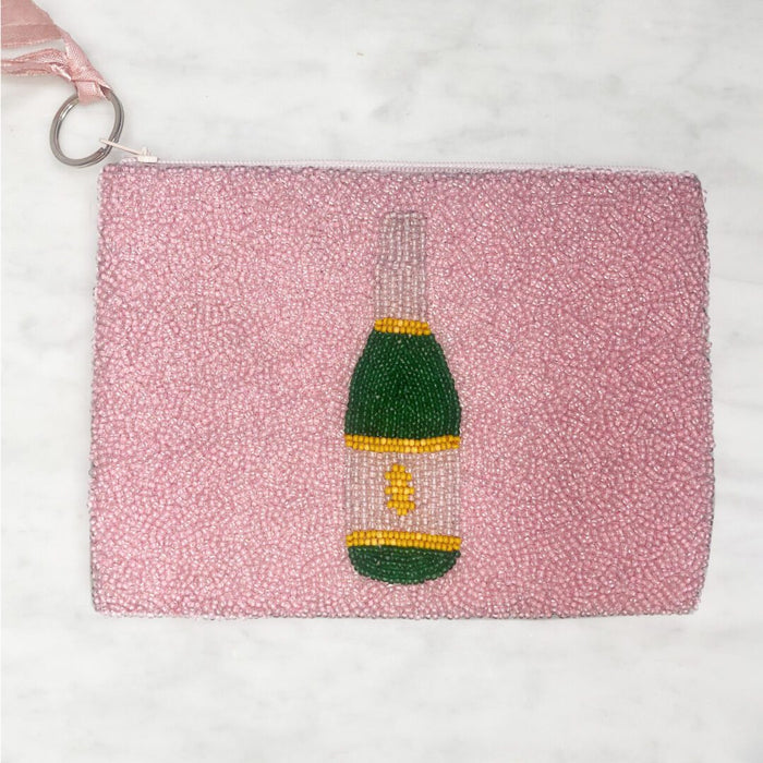 Back of pink beaded zipper pouch showing handcrafted green and gold champagne bottle design in seed beads