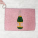 Back of pink beaded zipper pouch showing handcrafted green and gold champagne bottle design in seed beads