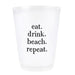 Frosted plastic cup with Eat Drink Beach Repeat black lettering for beach parties and summer entertaining