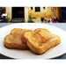French toast slices imprinted with Eiffel Tower design on a white plate
