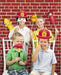 Red brick backdrop for kids firefighter photo booth with fire truck props