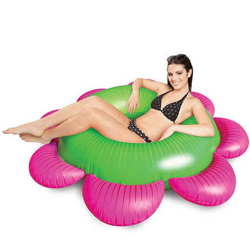 Giant pink and green flower inflatable pool float for summer pool parties and lounging