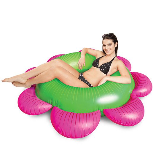 Giant pink and green flower inflatable pool float for summer pool parties and lounging