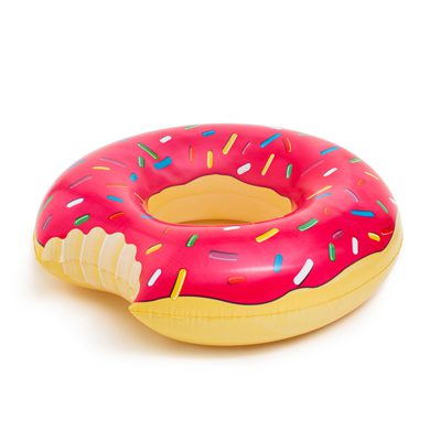 Giant pink donut inflatable pool float with sprinkles and bite detail in a swimming pool