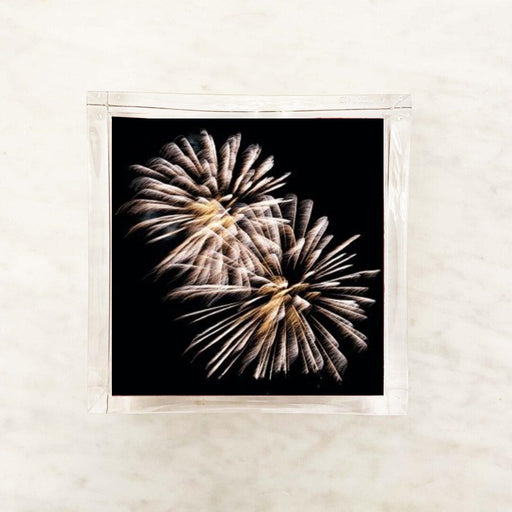 Golden fireworks cocktail napkins with black background and gold burst design for New Year’s Eve, champagne bars, birthdays, and celebrations.