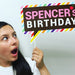 Girl holding custom birthday speech bubble printable photo booth prop
