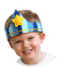 A child wearing a handmade blue and yellow felt crown with a star decoration