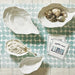 Set of 3 large white ceramic oyster shell bowls styled with oysters for coastal entertaining