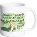 White ceramic mug with vintage woman artwork and the phrase I wonder if people look both ways before getting on my nerves