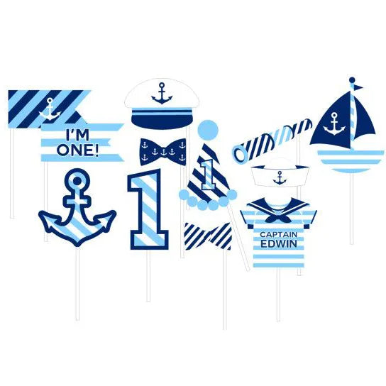 Nautical first birthday photo booth props with anchor, sailboat, captain hat and I'm One sign