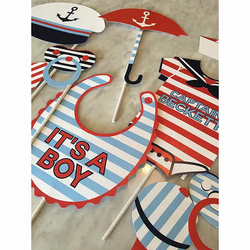 Personalized nautical baby shower printable photo booth props with It's a Boy bib and sailor onesie