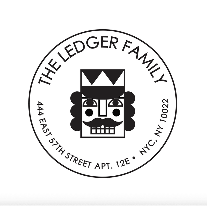 Nutcracker Address Stamp — round custom return address stamp with nutcracker illustration, shown with sample family name and NYC address