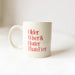 White mug with red text 'Older, Wiser & Hotter Than Ever' on a white background