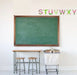 Palm beach printable alphabet banner letters A to Z displayed above classroom chalkboard