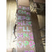 Palm beach alphabet banner printable letters A to Z displayed on wall in colorful pink and green