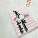 Pigeon Room Service Beaded Coin Purse — angled view of pink stripe beaded purse with pigeon and Room Service embroidery, keyring clip