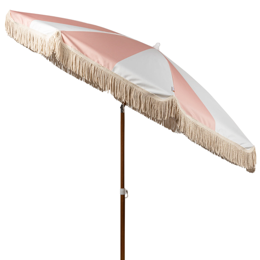 Pink and white striped beach umbrella with cotton fringe, faux wood pole, and UV 50 sun protection