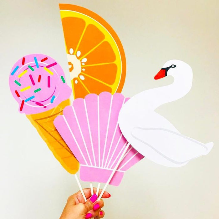 Pool floaties photo booth props with swan, orange slice, ice cream cone, donut, and pink shell designs for summer parties and pool birthdays.