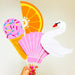 Pool floaties photo booth props with swan, orange slice, ice cream cone, donut, and pink shell designs for summer parties and pool birthdays.