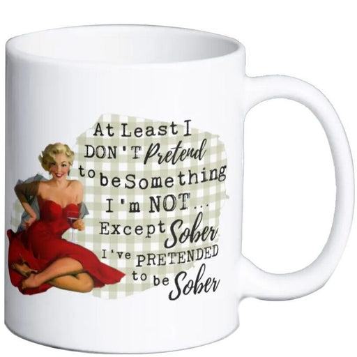 White ceramic mug with vintage pin-up style artwork and the phrase Pretend To Be Sober printed on the front.