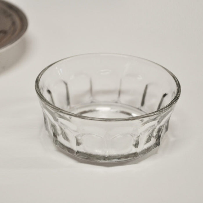 Silver Butter Dish — close-up of clear glass insert dish with faceted sides