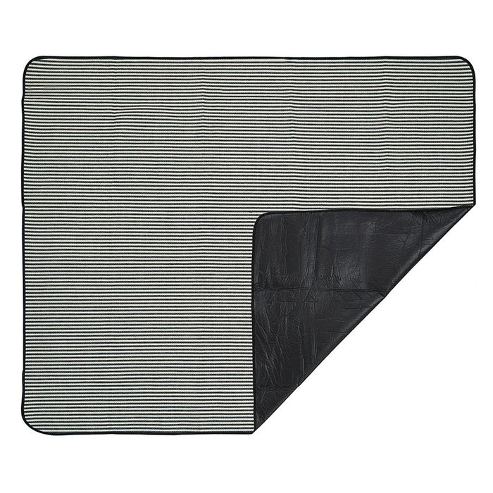 Striped Picnic Blanket — flat lay showing black and white stripe top with PEVA waterproof backing folded back