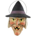 Vintage-inspired witch candy bucket with black hat, wire handle, and hand-painted paper mache face for Halloween decorating or trick-or-treat displays.