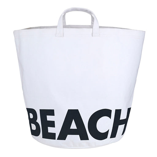 White canvas beach storage tote bag with bold black BEACH lettering — waterproof laminated lining, white background product shot
