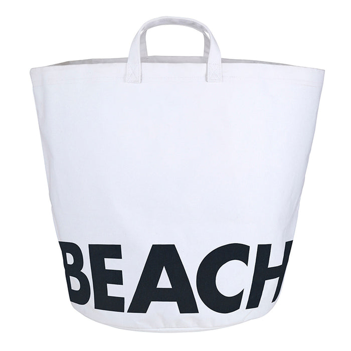White canvas beach storage tote bag with bold black BEACH lettering — waterproof laminated lining, white background product shot