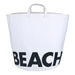 White canvas beach storage tote bag with bold black BEACH lettering — waterproof laminated lining, white background product shot