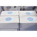 White Rectangular Paperboard Take-Out Box — four closed boxes styled with custom round labels, perfect for entertaining and gifting