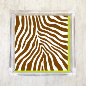 Paper napkin featuring a bold cocoa brown and white zebra stripe pattern with a green border