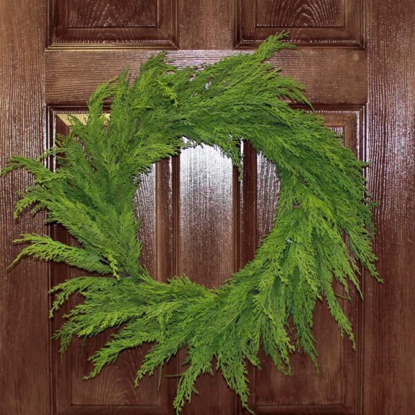 Realistic cedar wreath with faux cedar branches and natural twig base for