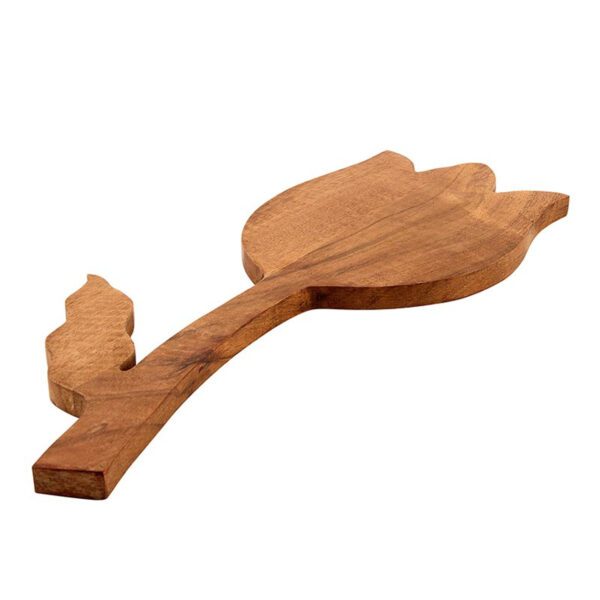 Handcrafted mango wood tulip-shaped cutting board with a single leaf detail, shown from a flat side angle